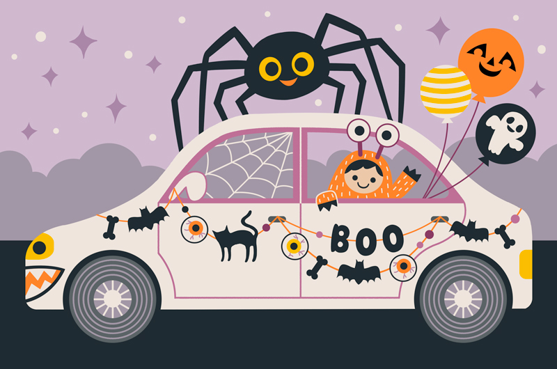 Família desfrutando de Halloween no Halloween Car Parade